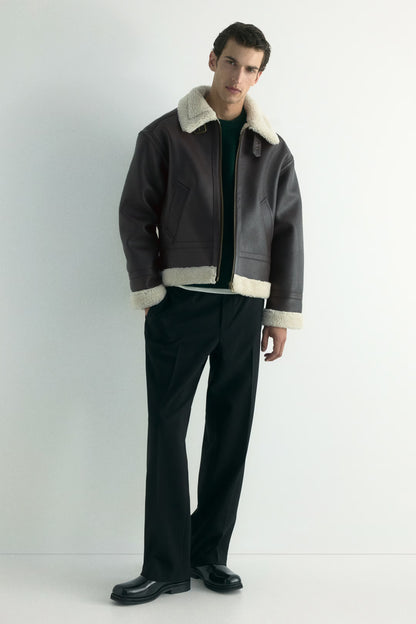 Elegant Women's Black Faux Leather Aviator Jacket with Teddy Trim